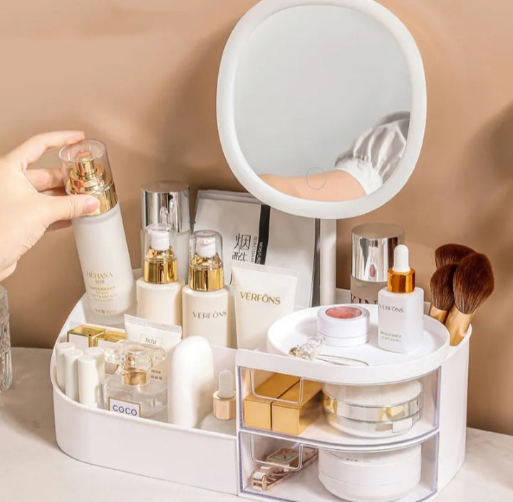 Cosmetiquera con espejo con tonos de iluminación